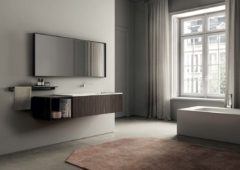 Mobile sospeso con finitura rovere termocotto e piano lavabo in cristalplant