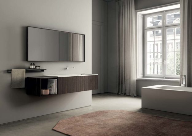 Mobile sospeso con finitura rovere termocotto e piano lavabo in cristalplant